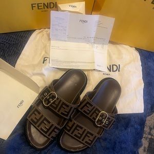 Worn fendi slides